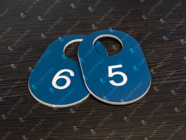 номерок для гардероба овальной формы